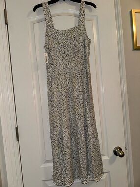 Sleeveless White Maxi Dress with Blue Floral Print